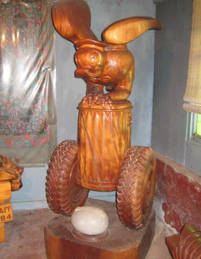 "D. Duck #1 as American Eagle on Trash Can on Snow-Tires" 1977-1978 MAHOGANY with ALABASTER zippered egg, 78"H x 28 3/4" x 28 3/4"